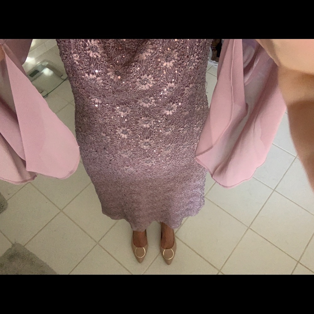 Flutter-sleeve sequined lace dress.